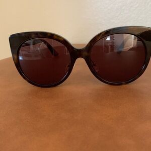 Gucci sunglasses (lenses are prescription so you would change out)